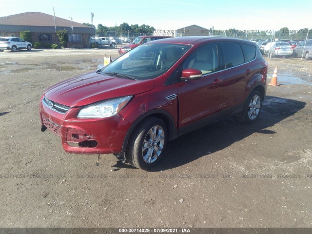 Photo 1 VIN: 1FMCU9H94DUD72928 - FORD ESCAPE 