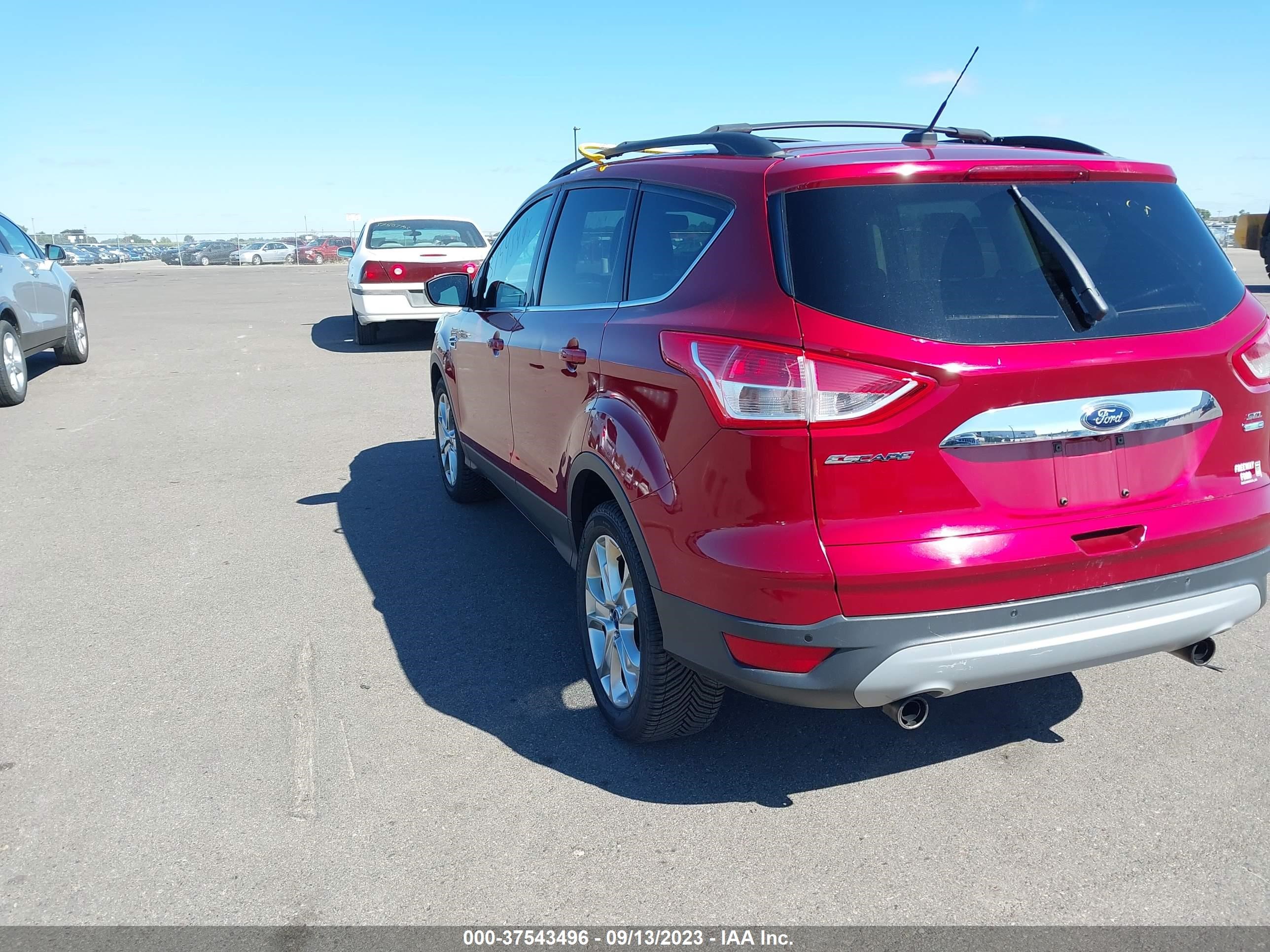 Photo 2 VIN: 1FMCU9H98DUB39991 - FORD ESCAPE 