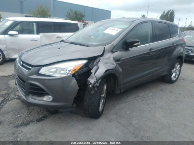 Photo 1 VIN: 1FMCU9H9XDUA60340 - FORD ESCAPE 