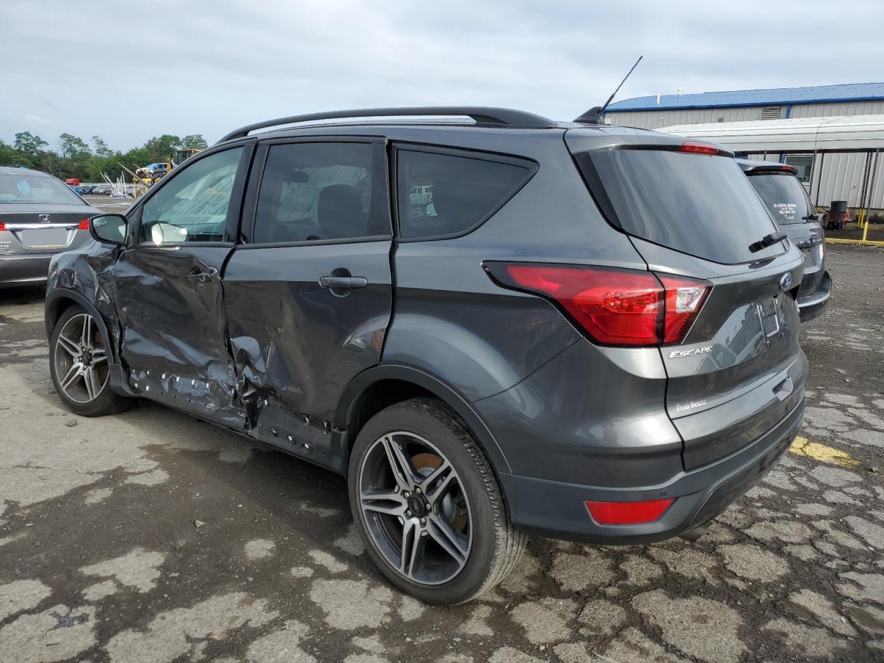 Photo 1 VIN: 1FMCU9HD1KUA48868 - FORD ESCAPE 