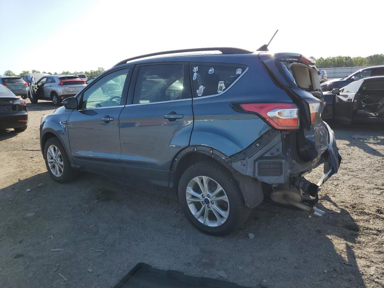 Photo 1 VIN: 1FMCU9HD5JUB02753 - FORD ESCAPE 