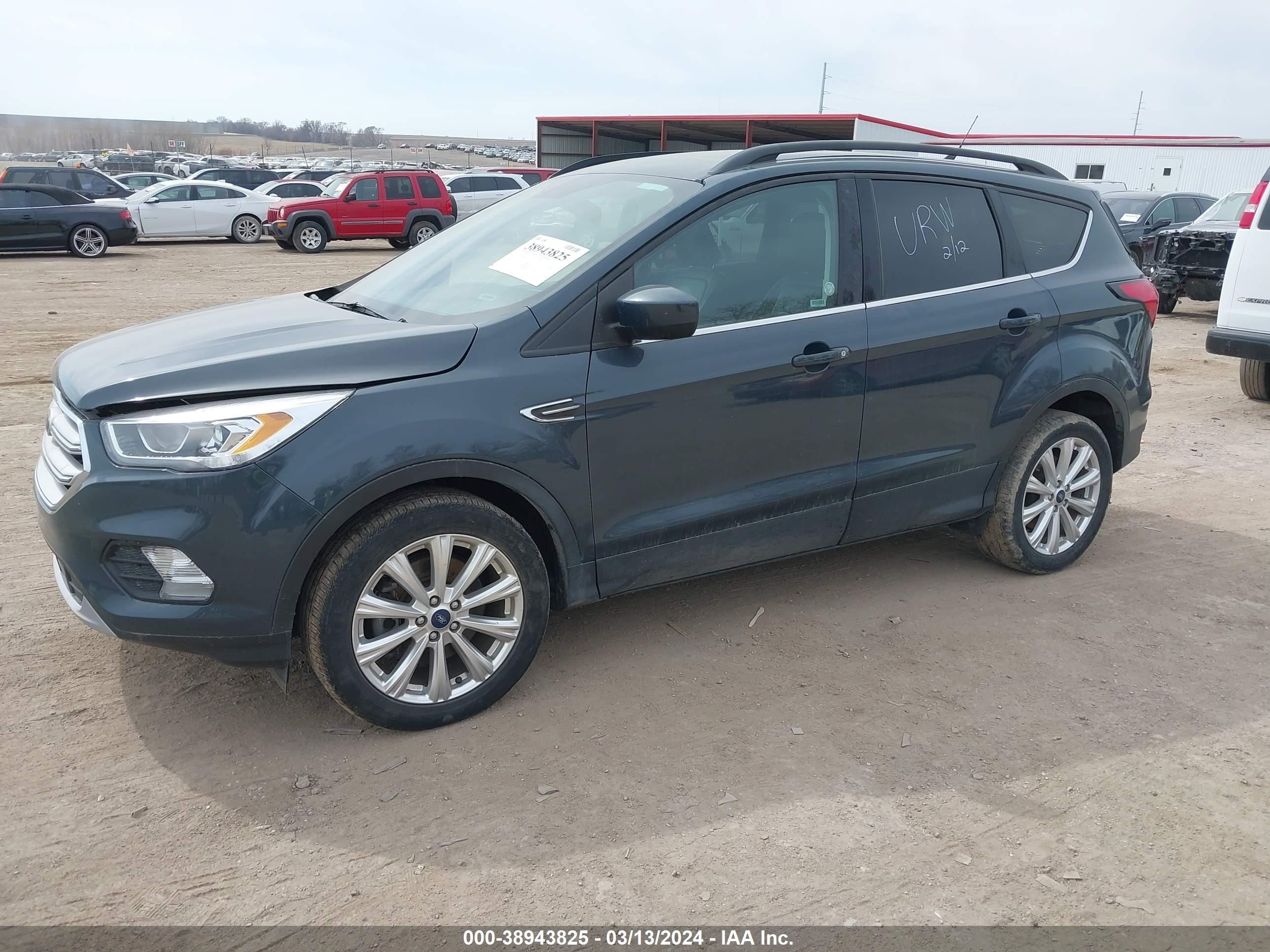 Photo 1 VIN: 1FMCU9HD5KUA86569 - FORD ESCAPE 