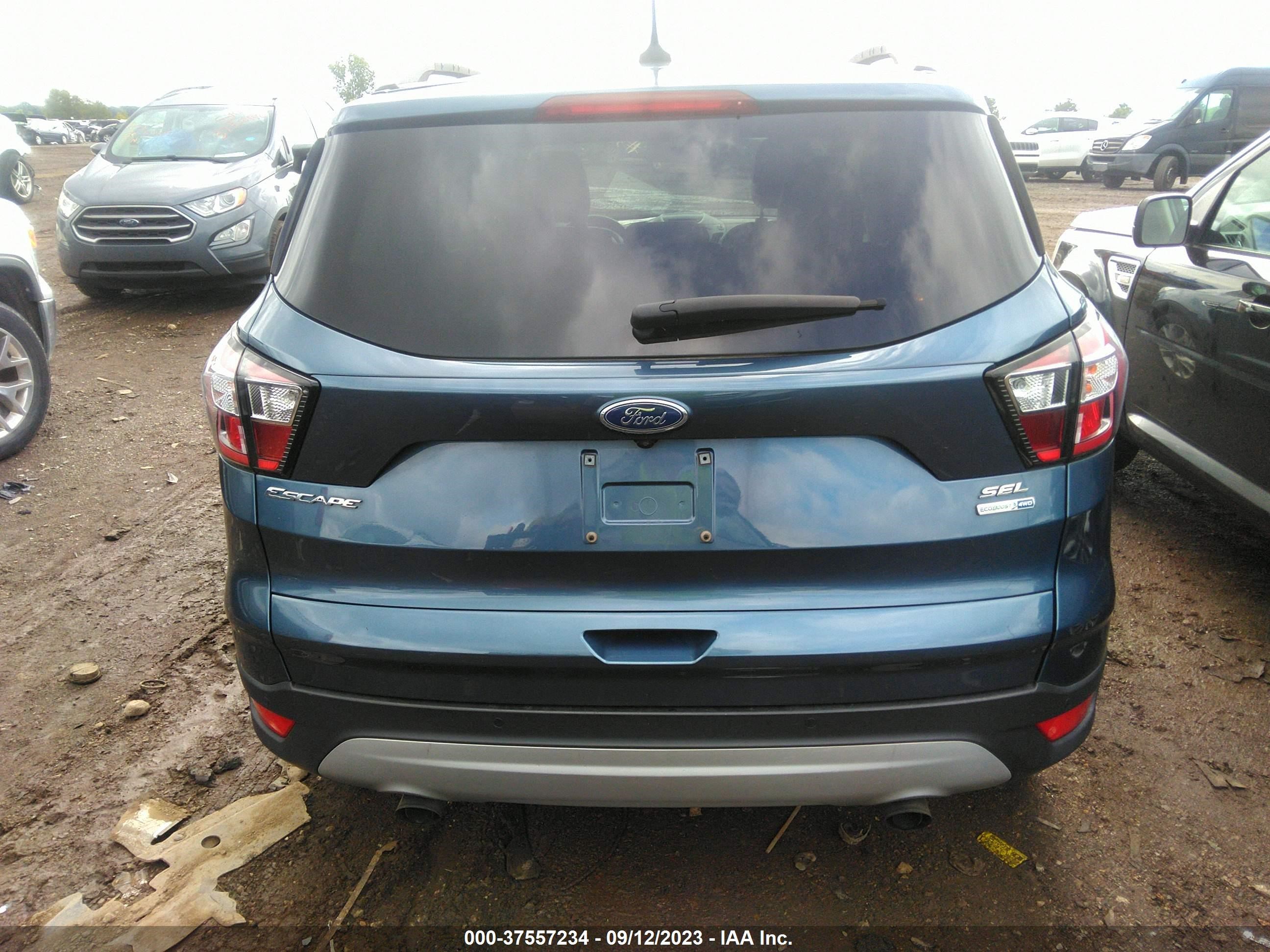 Photo 15 VIN: 1FMCU9HD7JUA99127 - FORD ESCAPE 