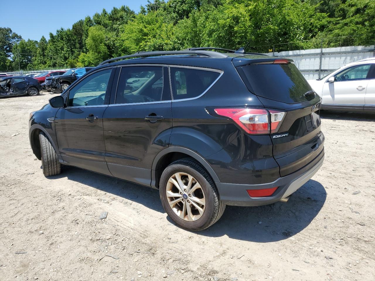 Photo 1 VIN: 1FMCU9HDXJUB86889 - FORD ESCAPE 