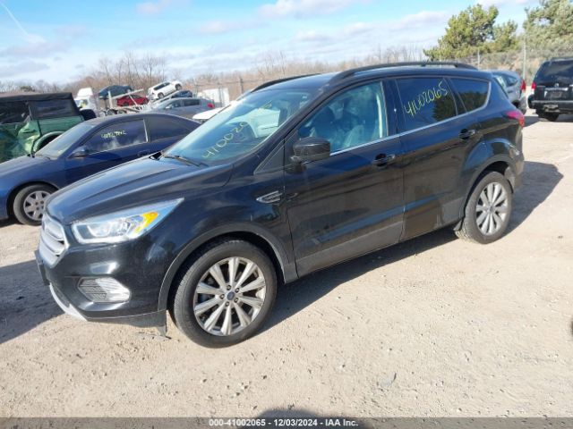 Photo 1 VIN: 1FMCU9HDXKUB75750 - FORD ESCAPE 