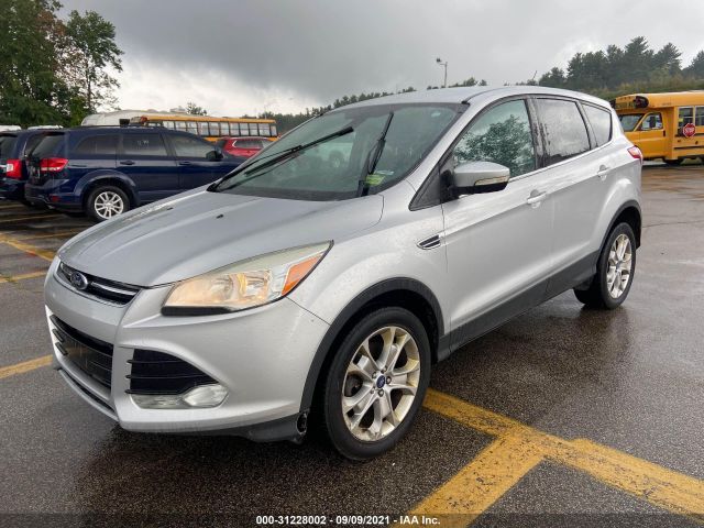 Photo 1 VIN: 1FMCU9HX1DUD11826 - FORD ESCAPE 