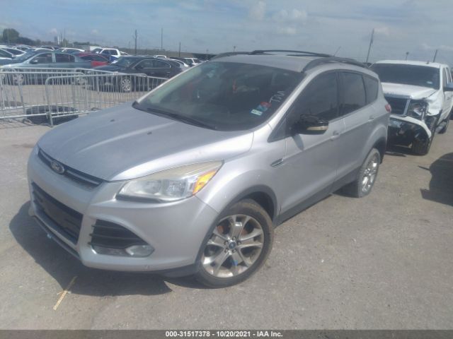 Photo 1 VIN: 1FMCU9HX3DUB95514 - FORD ESCAPE 