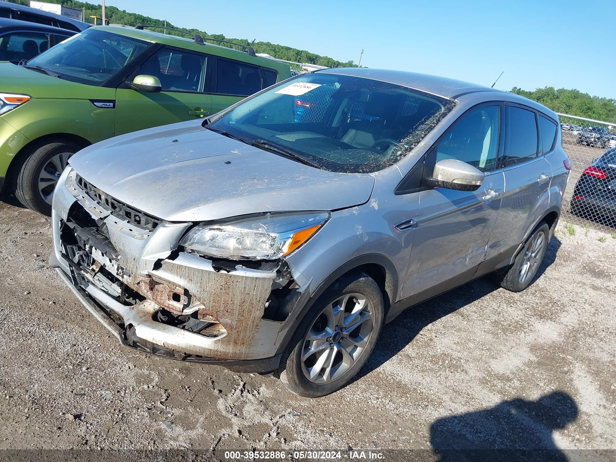 Photo 1 VIN: 1FMCU9HX4DUD72054 - FORD ESCAPE 