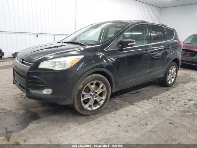 Photo 1 VIN: 1FMCU9HX6DUC37786 - CHEVROLET SONIC 