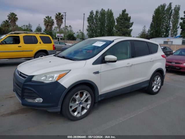 Photo 1 VIN: 1FMCU9HX6DUD57099 - FORD ESCAPE 