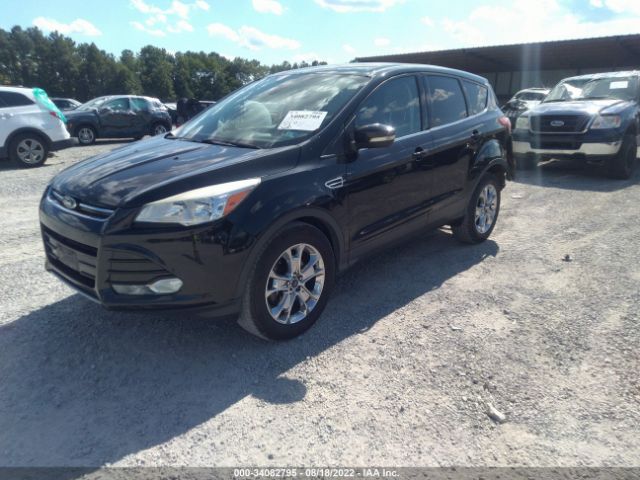 Photo 1 VIN: 1FMCU9HX7DUC30765 - FORD ESCAPE 