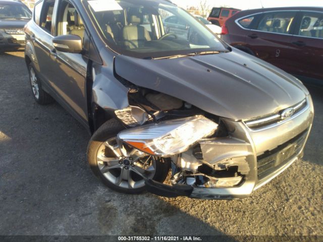 Photo 5 VIN: 1FMCU9J94EUA74570 - FORD ESCAPE 