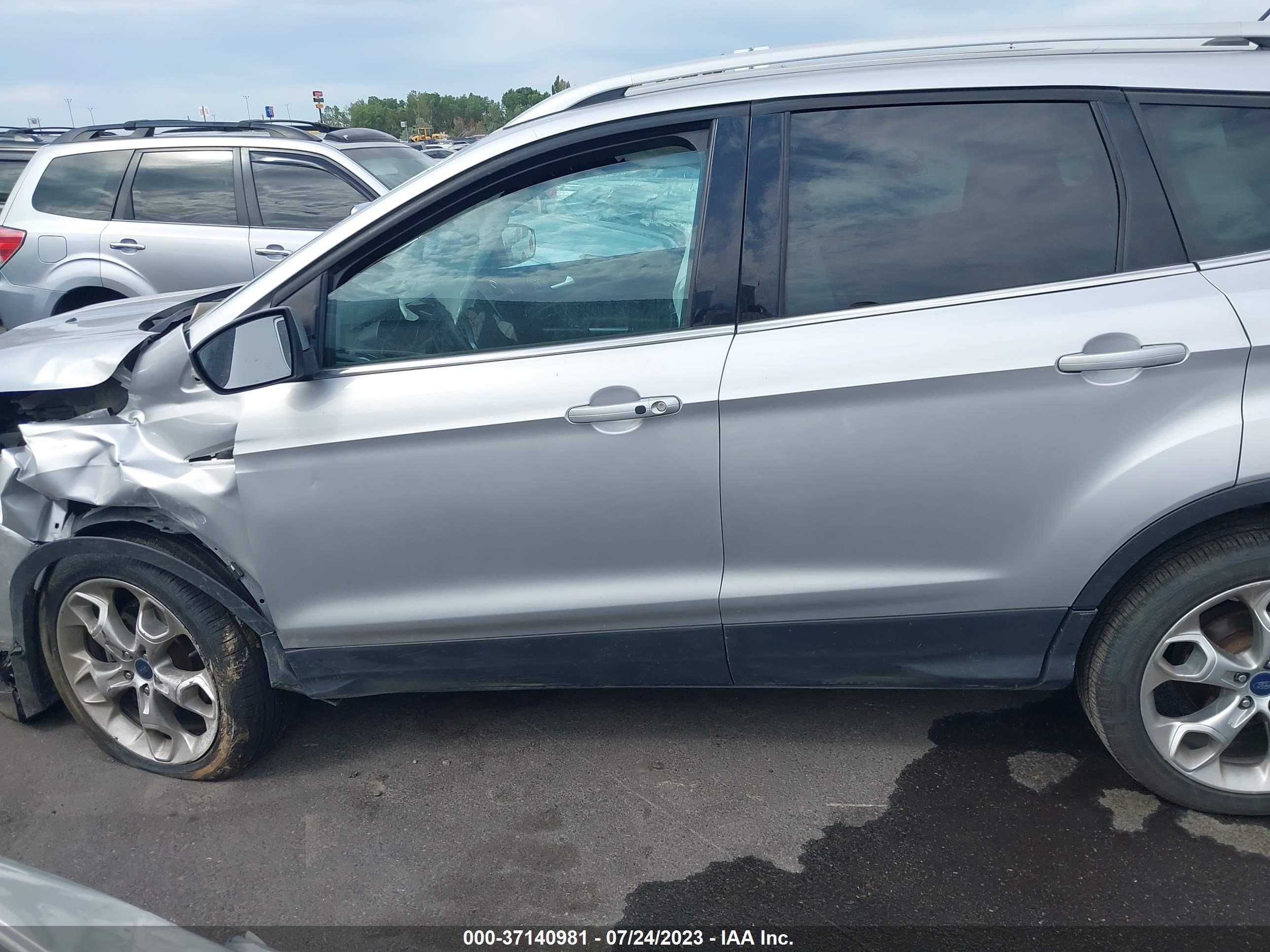 Photo 12 VIN: 1FMCU9J94EUC21874 - FORD ESCAPE 