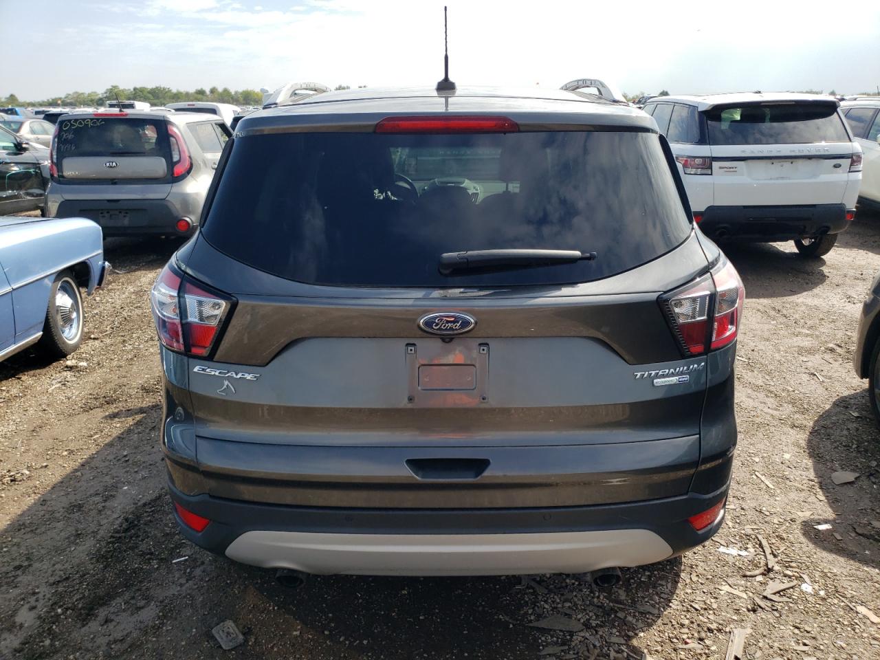 Photo 5 VIN: 1FMCU9J94HUC13360 - FORD ESCAPE 