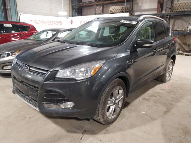 Photo 1 VIN: 1FMCU9J99GUC67977 - FORD ESCAPE TIT 