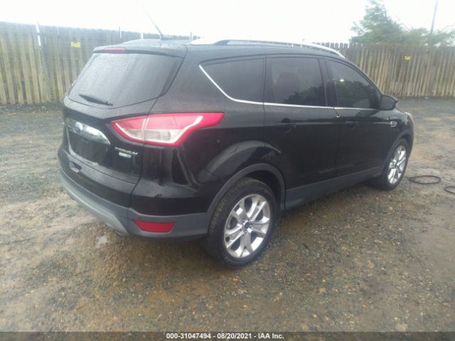 Photo 3 VIN: 1FMCU9JX5GUB64845 - FORD ESCAPE 