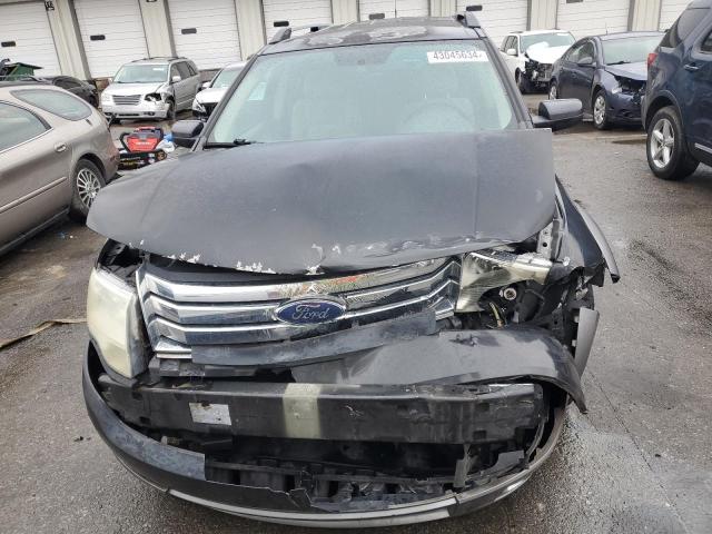 Photo 4 VIN: 1FMDK02W38GA03356 - FORD TAURUS 