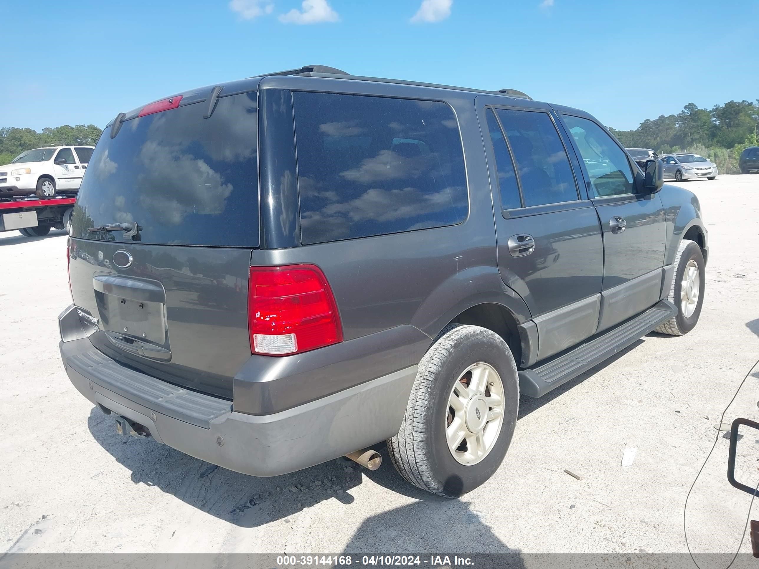 Photo 3 VIN: 1FMDU15L74LA63883 - FORD EXPEDITION 