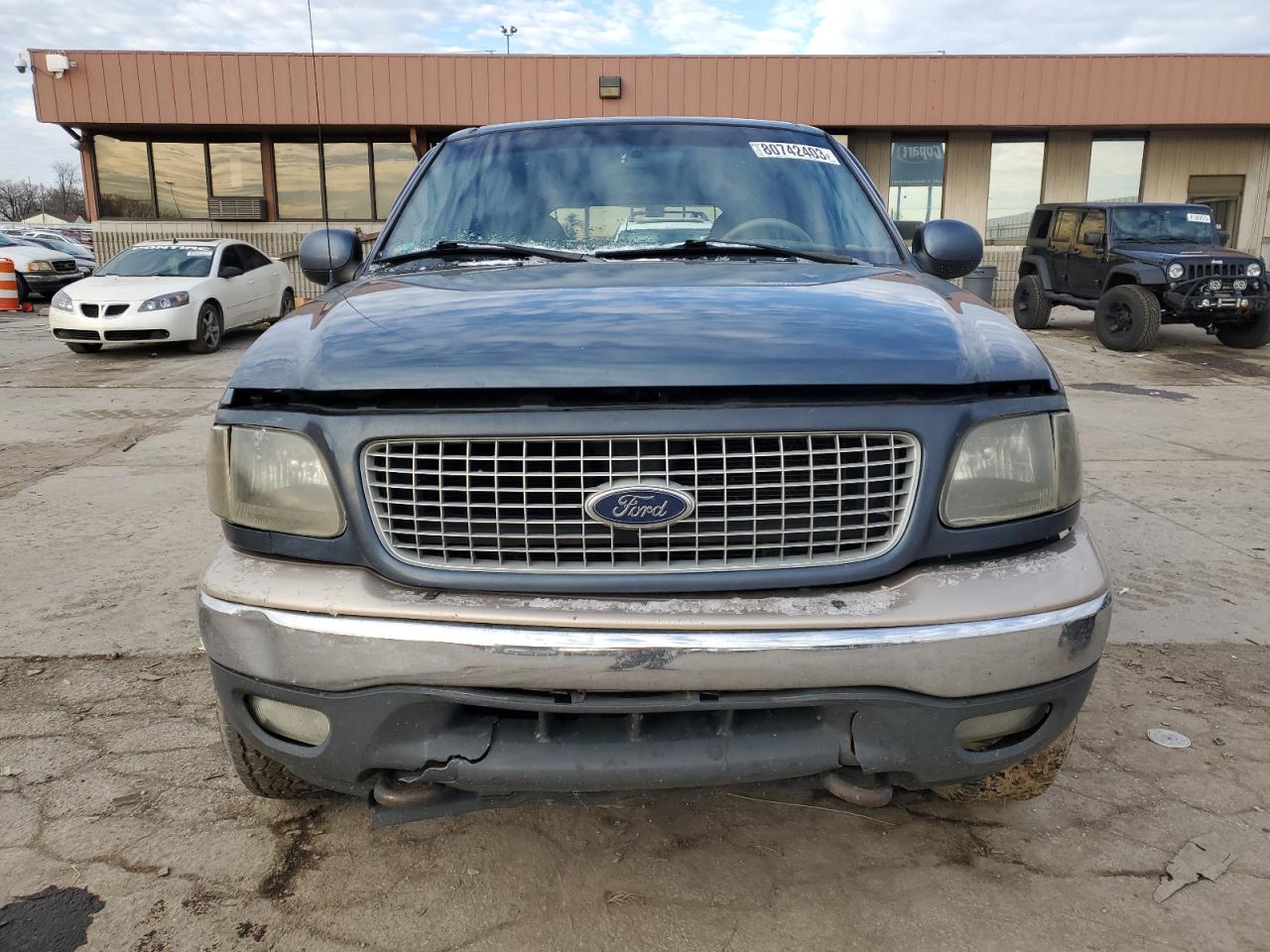 Photo 4 VIN: 1FMPU18L6XLA71036 - FORD EXPEDITION 