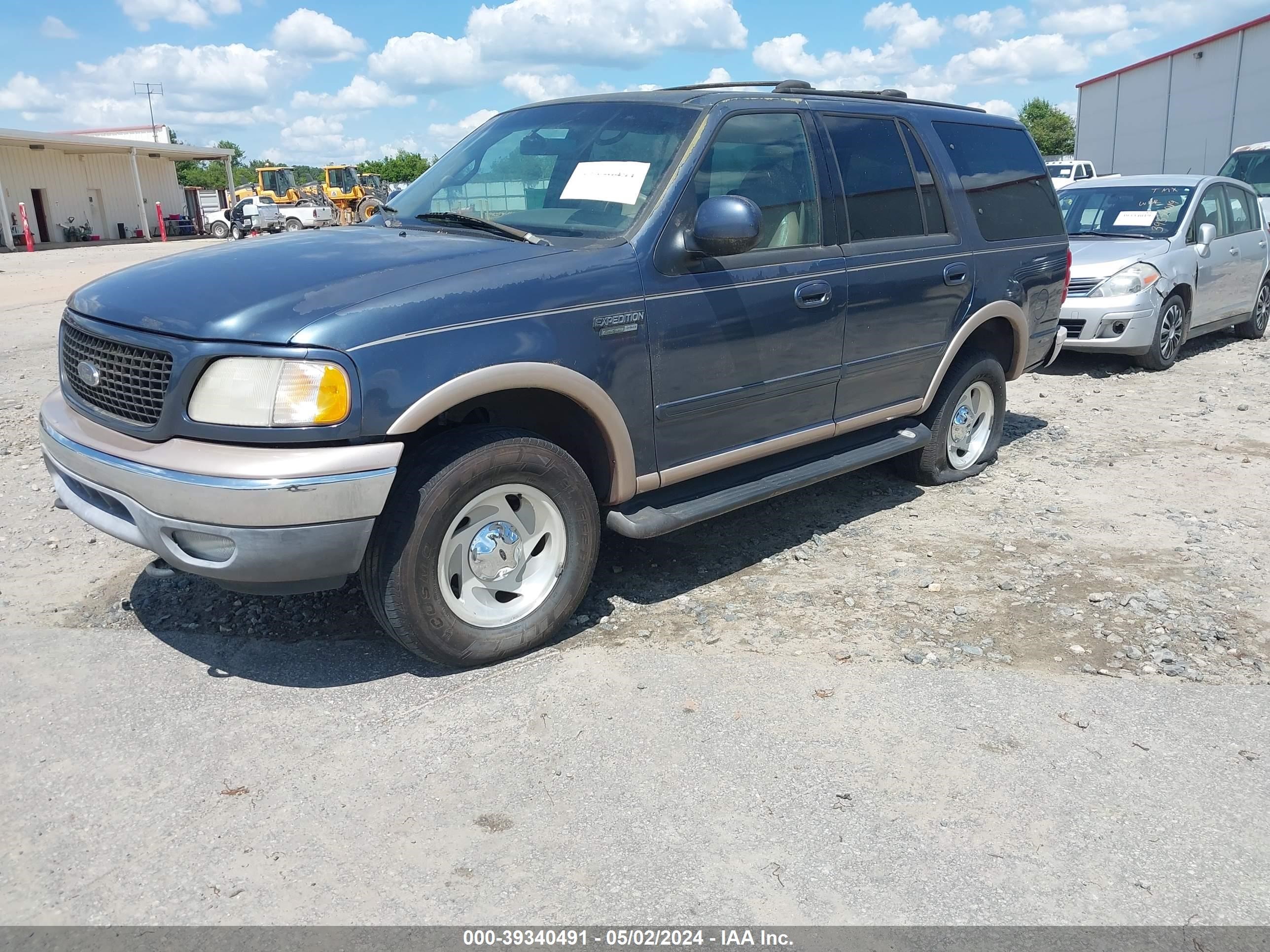 Photo 1 VIN: 1FMPU18L9XLB48384 - FORD EXPEDITION 