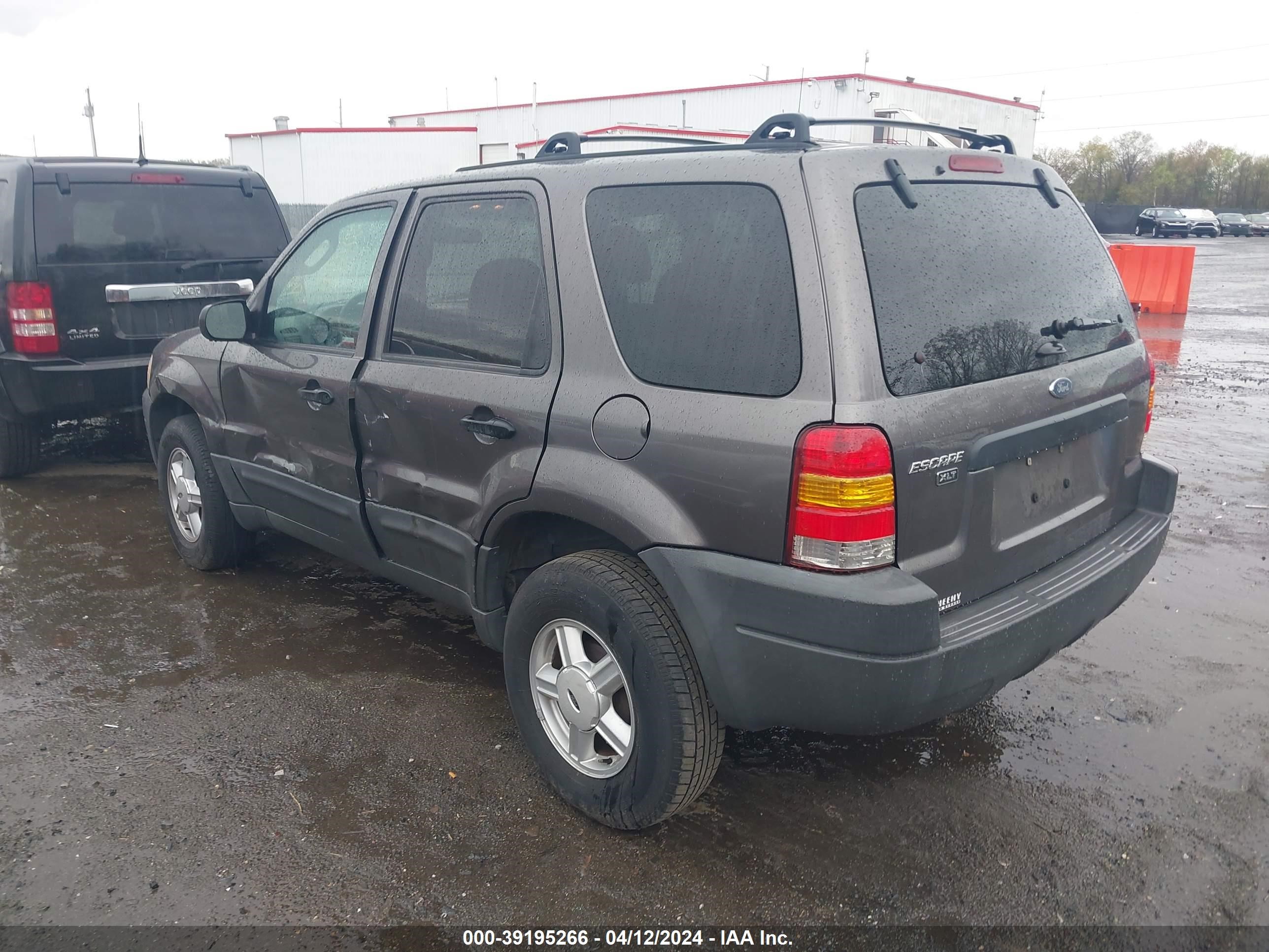 Photo 2 VIN: 1FMYU031X3KE21563 - FORD ESCAPE 