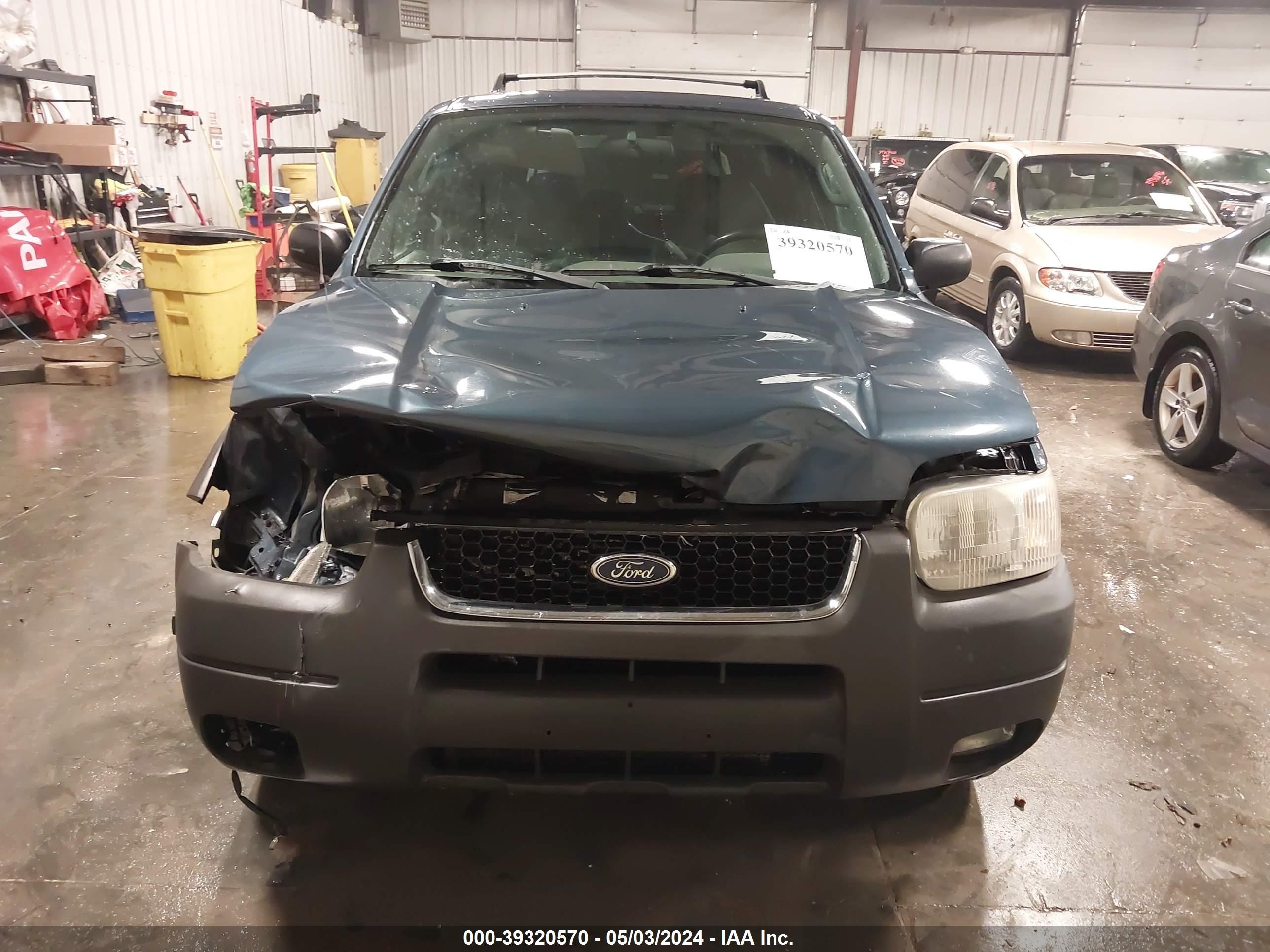 Photo 11 VIN: 1FMYU04111KB21695 - FORD ESCAPE 