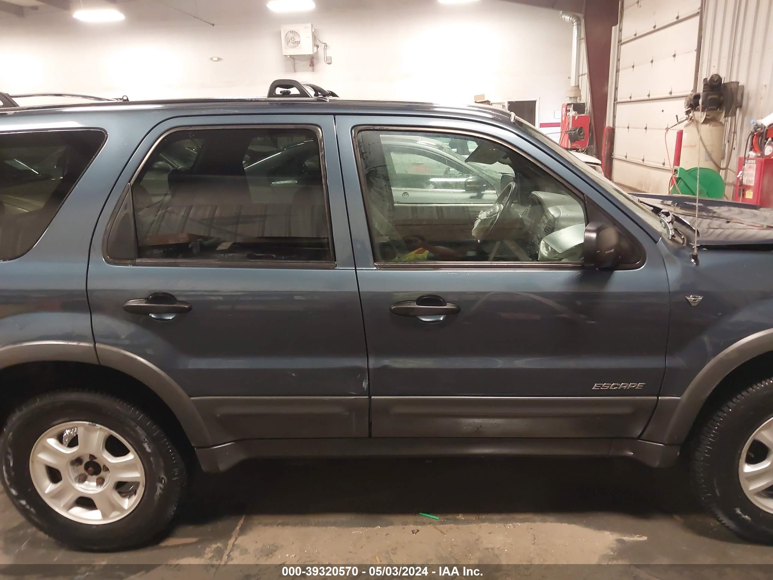 Photo 12 VIN: 1FMYU04111KB21695 - FORD ESCAPE 