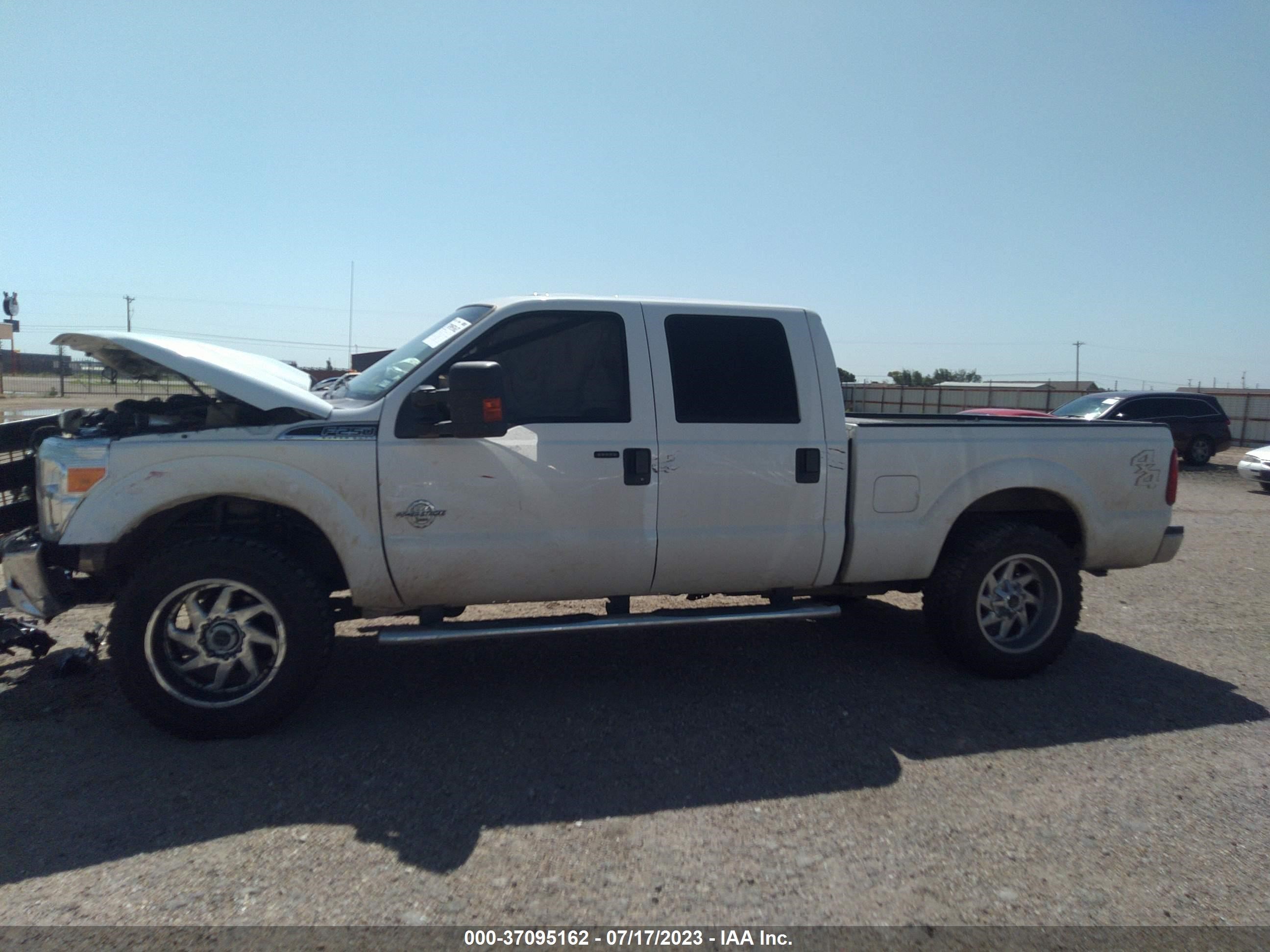 Photo 12 VIN: 1FT7W2BT3CEC25679 - FORD F250 