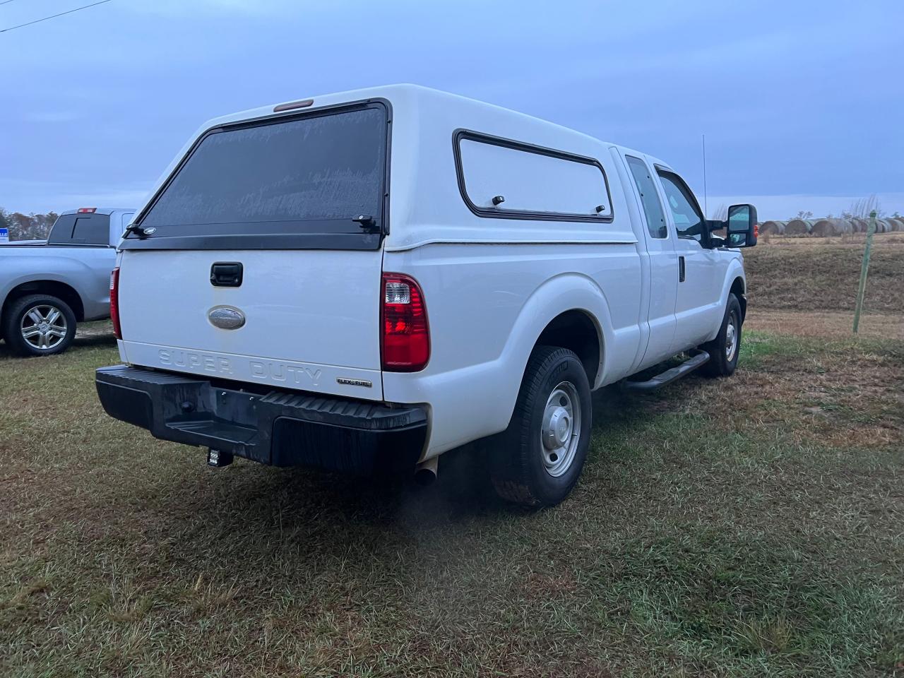 Photo 3 VIN: 1FT7X2A64CEB54663 - FORD F250 