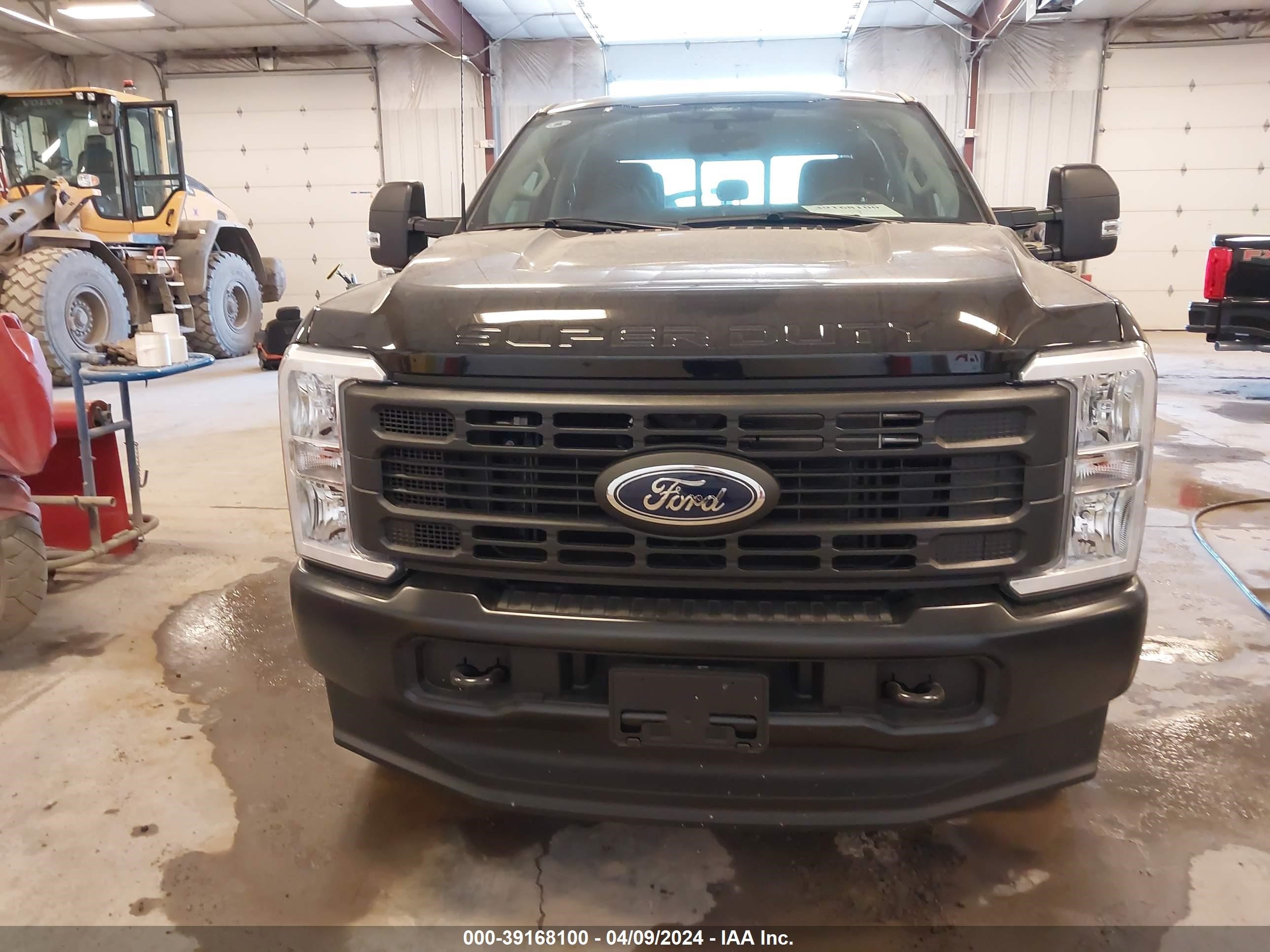 Photo 10 VIN: 1FT8W3BA9RED53605 - FORD F350 