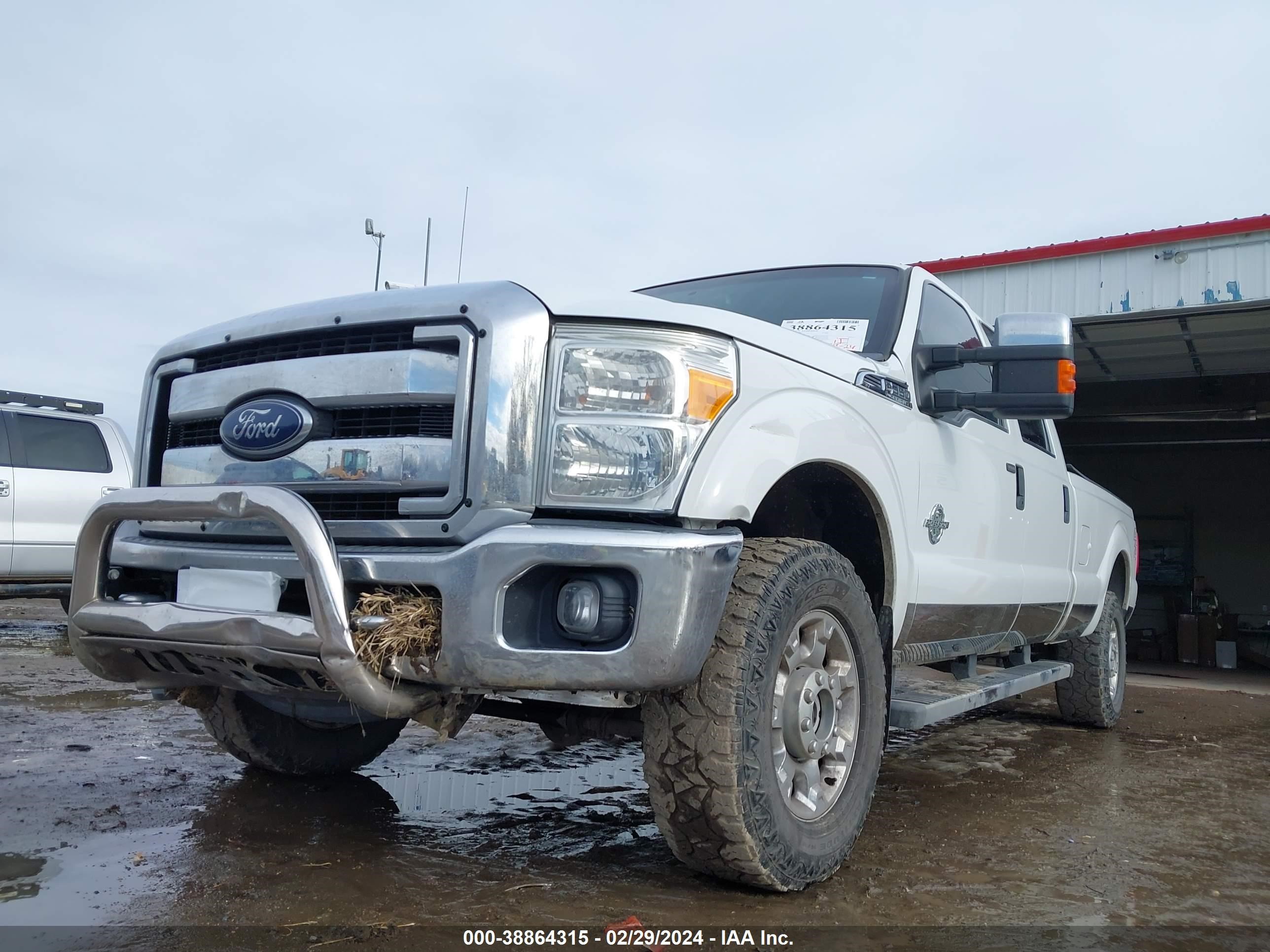 Photo 12 VIN: 1FT8W3BT8EEA42615 - FORD F350 