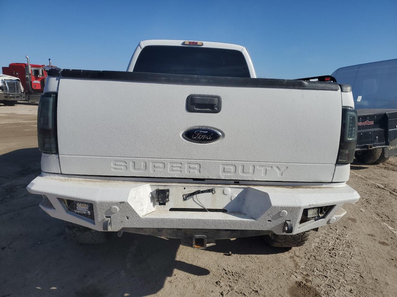 Photo 5 VIN: 1FT8W3BT9BEA40299 - FORD F350 