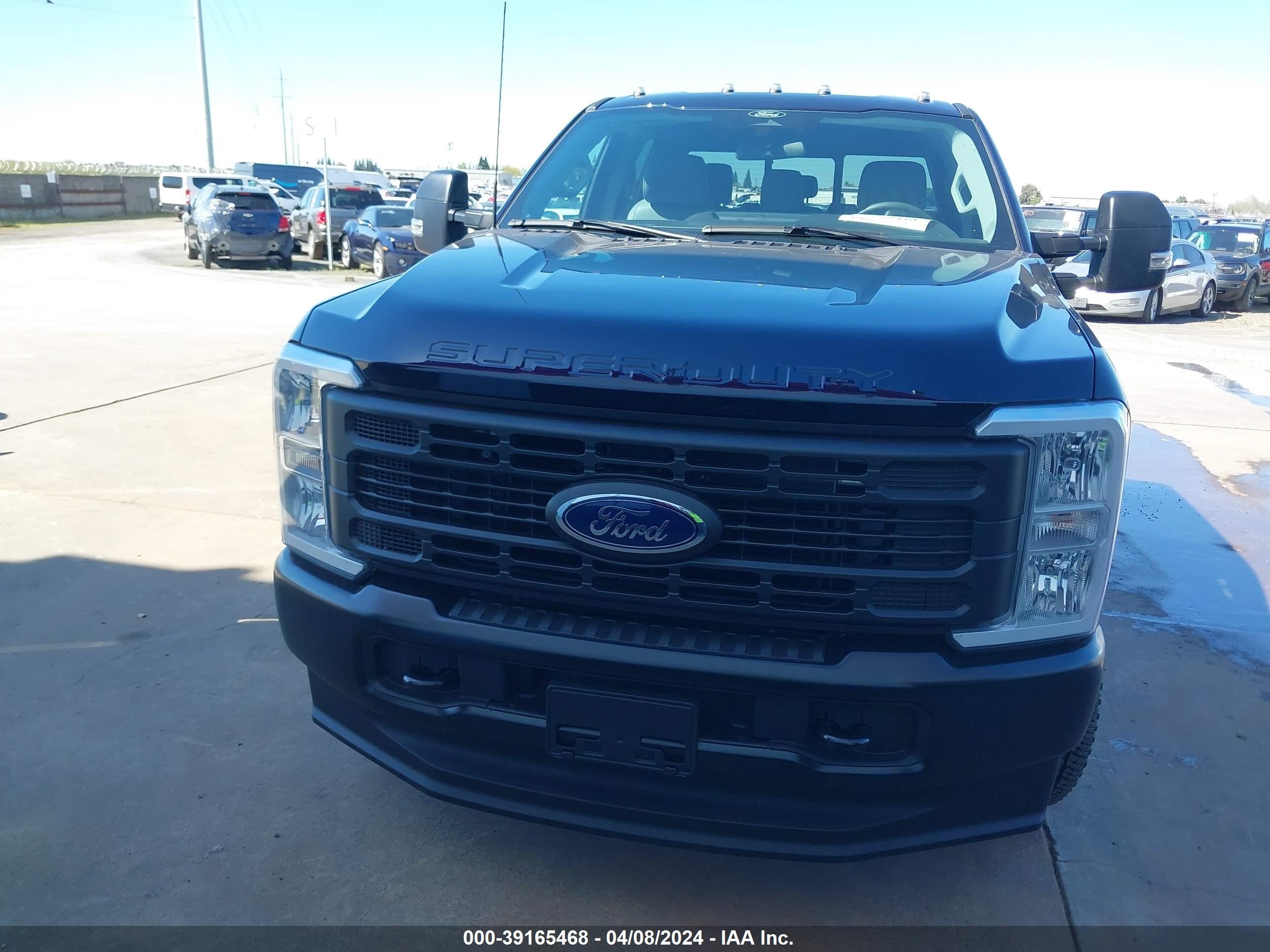 Photo 10 VIN: 1FT8W3DA8RED30765 - FORD F350 