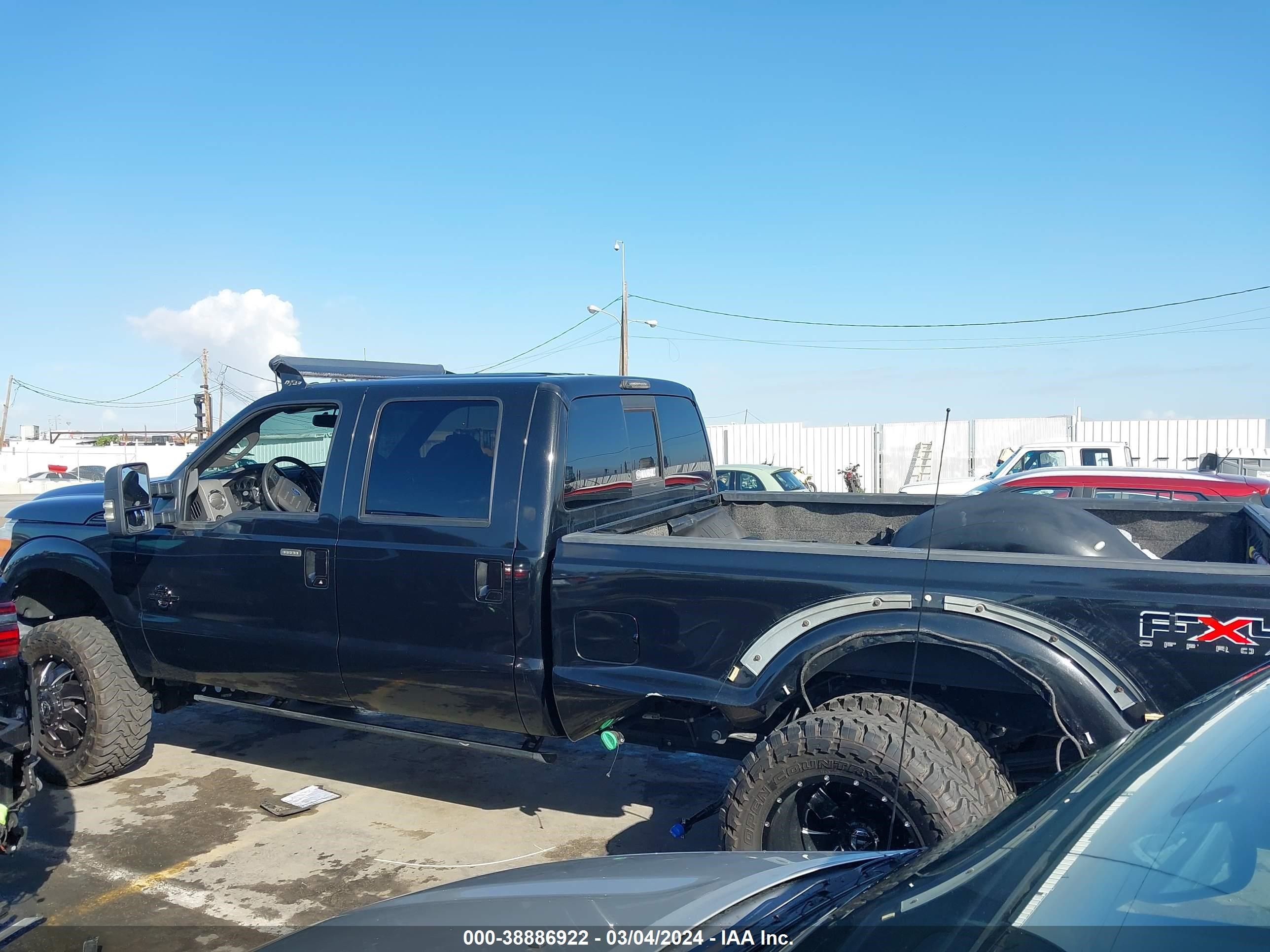 Photo 14 VIN: 1FT8W3DT6BEA99310 - FORD F350 