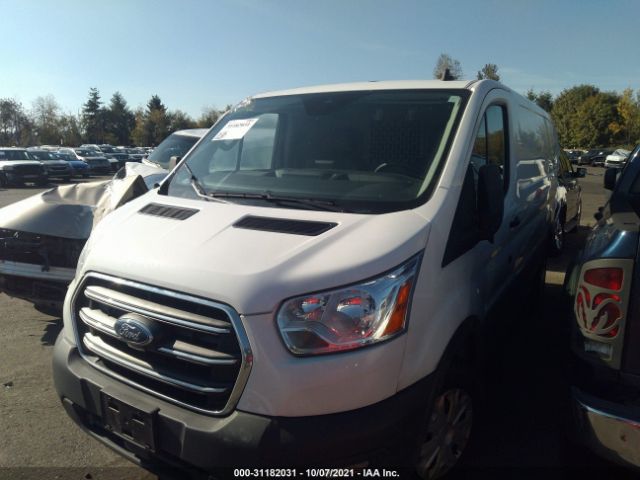 Photo 1 VIN: 1FTBR1Y8XLKA70189 - FORD TRANSIT CARGO VAN 