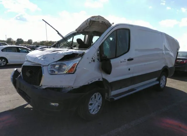 Photo 1 VIN: 1FTBR1Y8XMKA58481 - FORD TRANSIT CARGO VAN 