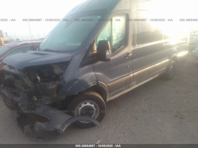 Photo 1 VIN: 1FTBR3X87LKA18256 - FORD TRANSIT CARGO VAN 