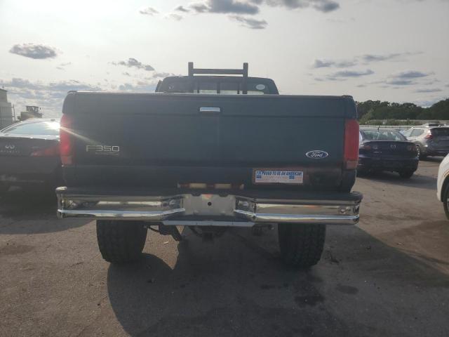 Photo 5 VIN: 1FTHF36F9VEC25977 - FORD F350 