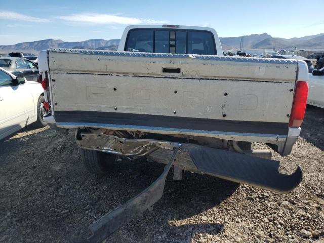 Photo 5 VIN: 1FTHX25F4VEC98554 - FORD F250 