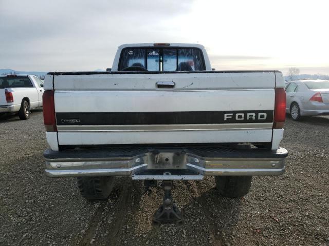 Photo 5 VIN: 1FTHX26MXRKA60597 - FORD F250 