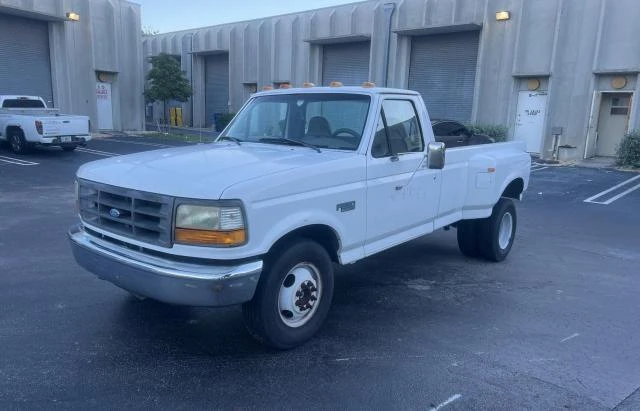 Photo 1 VIN: 1FTJF35H8VEC27563 - FORD F350 