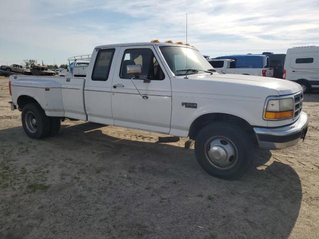 Photo 3 VIN: 1FTJX35G8VEB04429 - FORD F350 