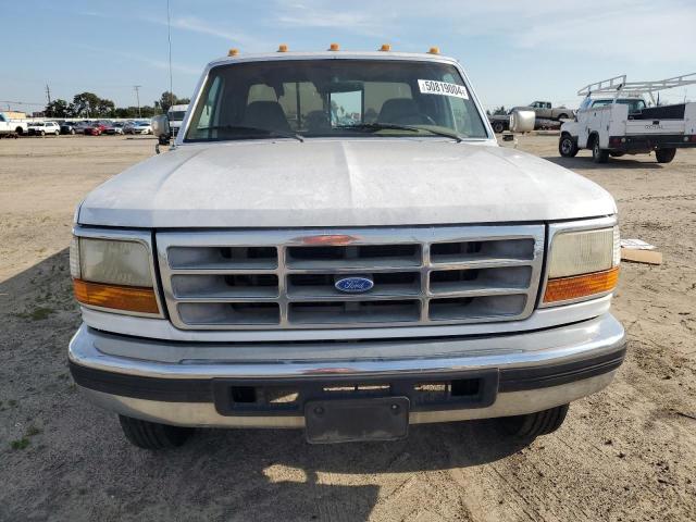 Photo 4 VIN: 1FTJX35G8VEB04429 - FORD F350 