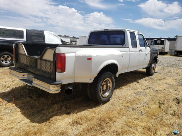 Photo 2 VIN: 1FTJX35M3PKA13269 - FORD F350 