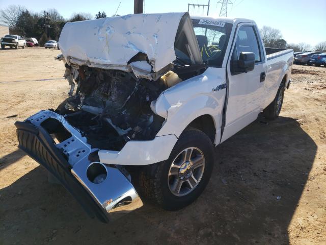 Photo 1 VIN: 1FTMF1CM0EKE13648 - FORD F150 