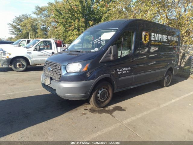 Photo 1 VIN: 1FTNE2CM9FKA29575 - FORD TRANSIT CARGO VAN 