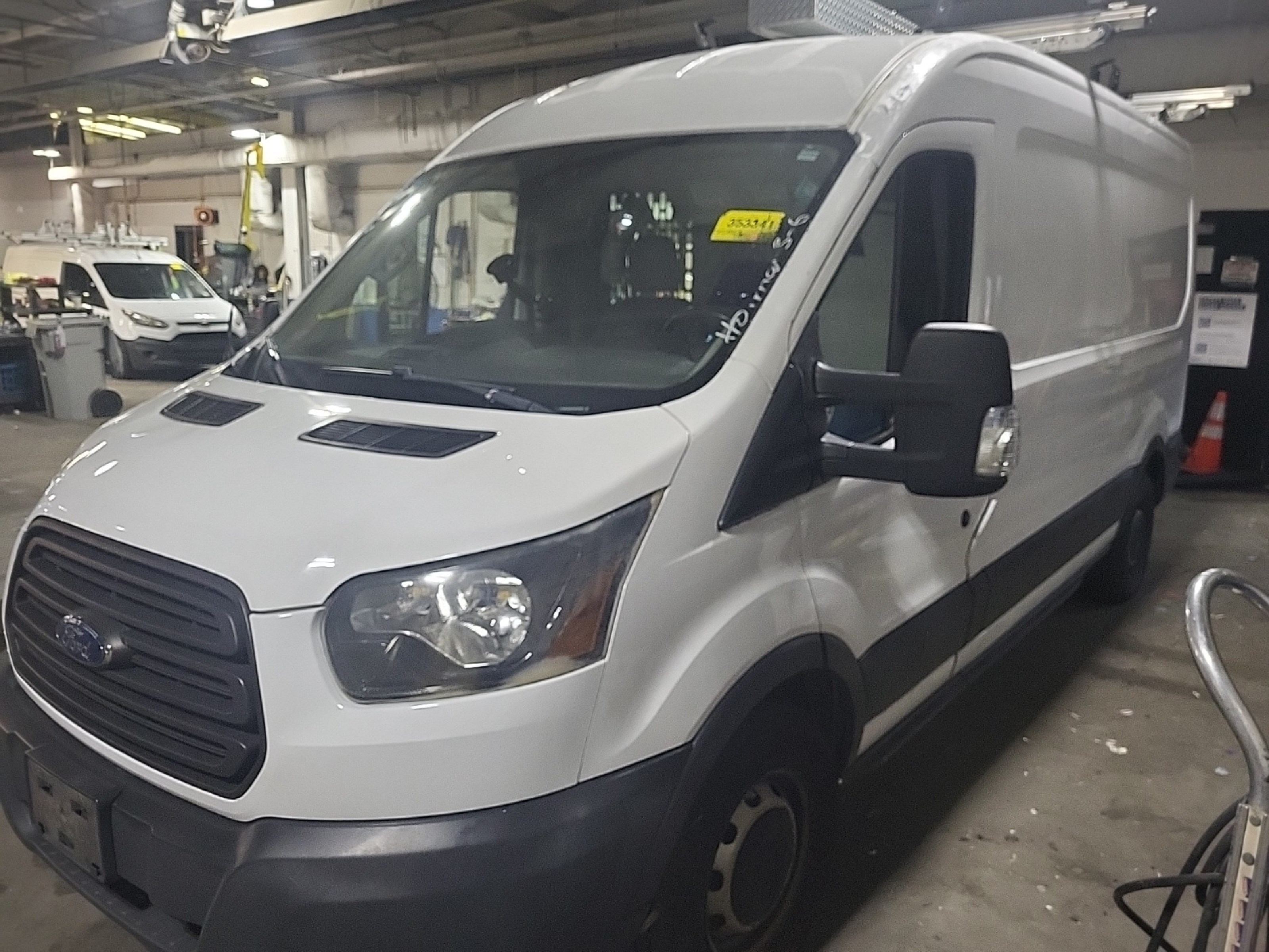 Photo 10 VIN: 1FTNE2CMXFKA04099 - FORD TRANSIT 