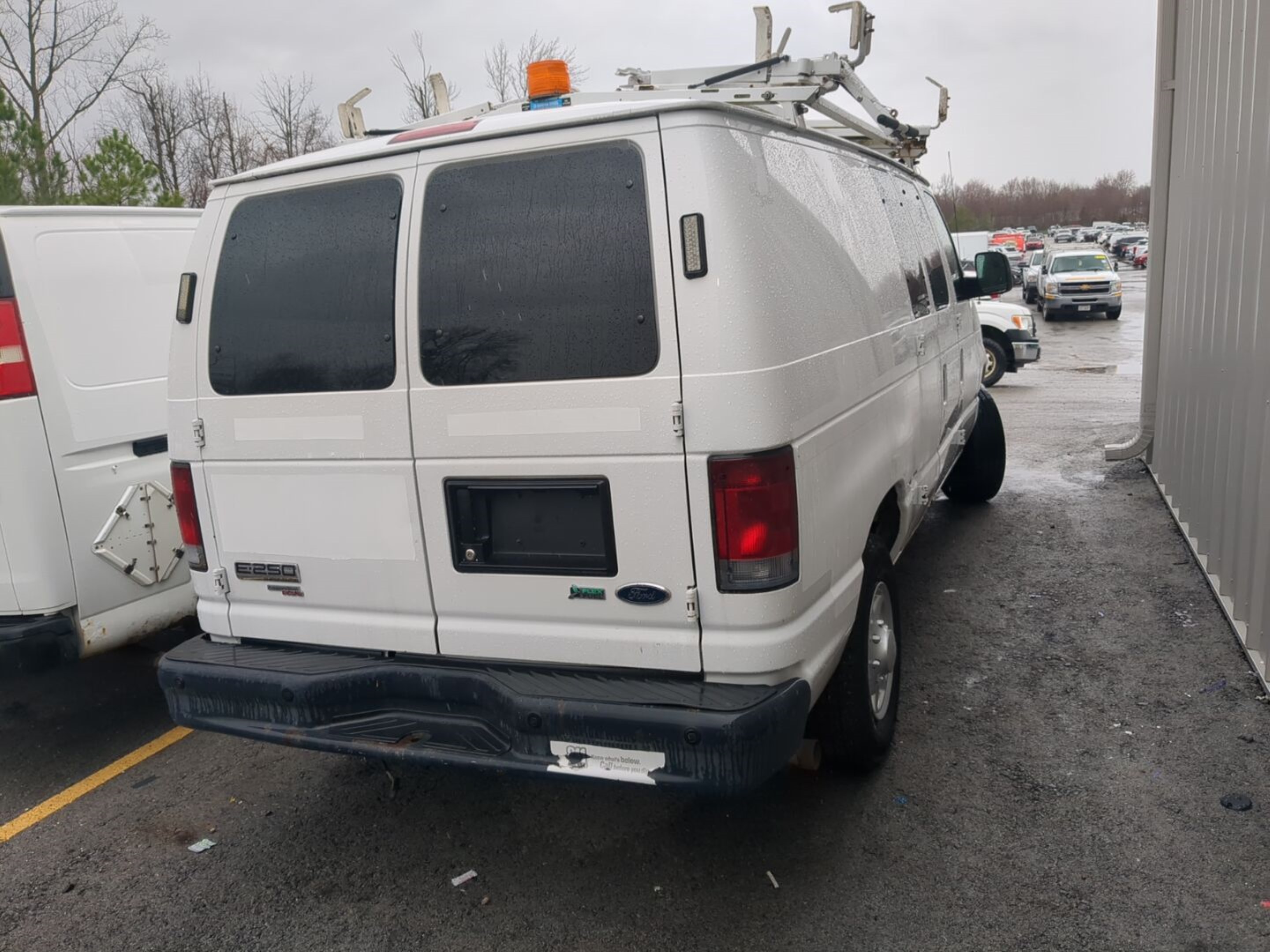 Photo 9 VIN: 1FTNE2ELXBDA18524 - FORD ECONOLINE 