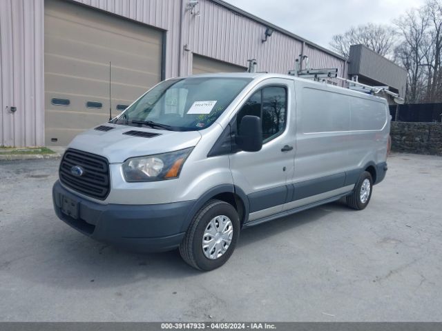 Photo 1 VIN: 1FTNE9ZMXFKA26149 - FORD TRANSIT-150 