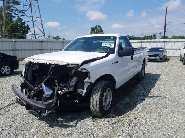 Photo 1 VIN: 1FTNF1CF2BKD12404 - FORD F150 